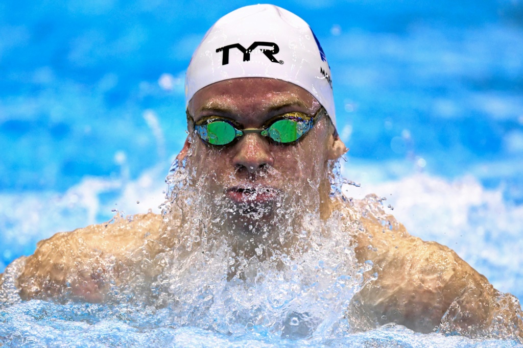 فاز الفرنسي ليون مارشان بثلاث ميداليات ذهبية في بطولة العالم للسباحة في فوكوكا (ا ف ب)