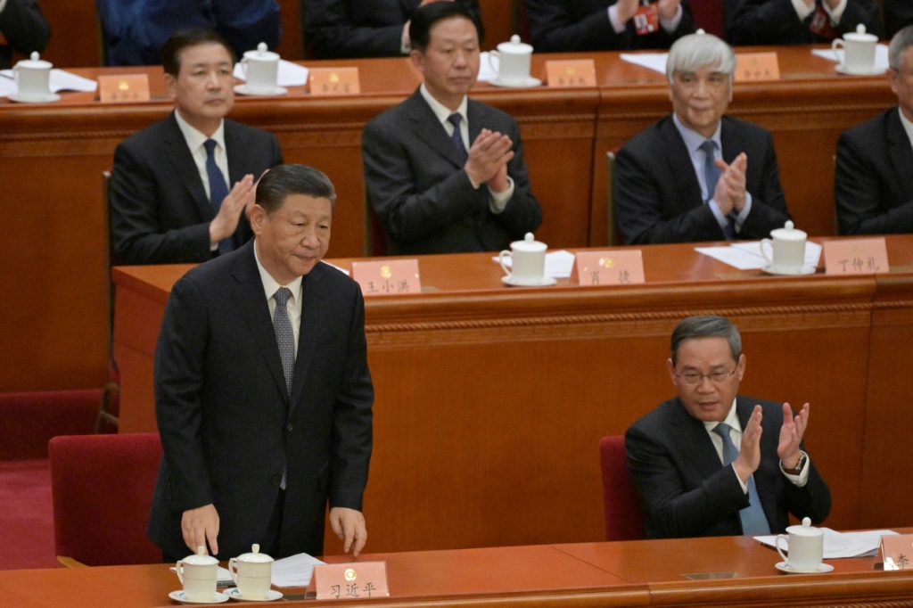 الرئيس الصيني شي جين بينغ خلال حفل افتتاح الدورة السنوية للبرلمان الصيني في بكين في 4 آذار/مارس 2024 (أ ف ب)   
