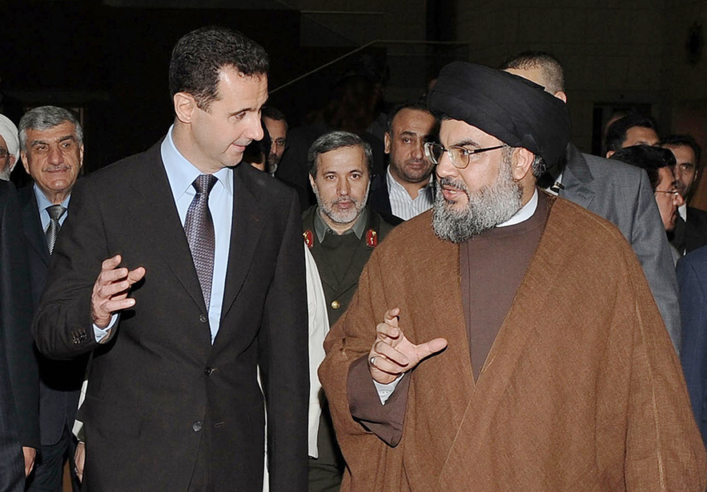    الأمين العام لحزب الله حسن نصرالله، والرئيس السوري بشار الأسد