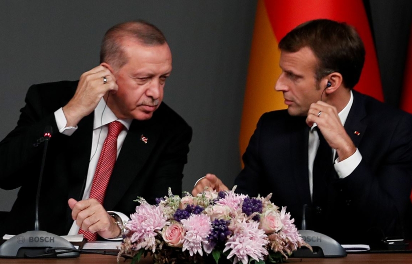 الرئيس التركي أردوغان والرئيس الفرنسي ماكرون