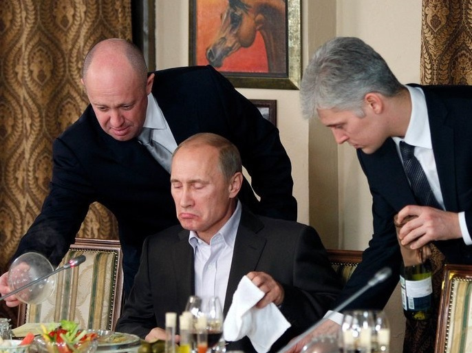 الرئيس الروسي فلاديمير بوتين، ورجل العمال الروسي يفغيني بريغوجين
