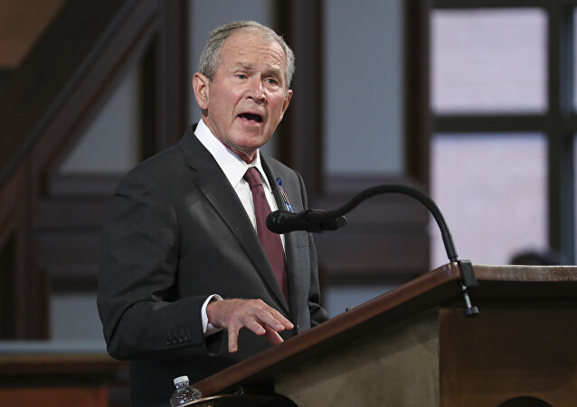 الرئيس الأمريكي الأسبق جورج بوش الذي أطلق "الحرب على الإرهاب"