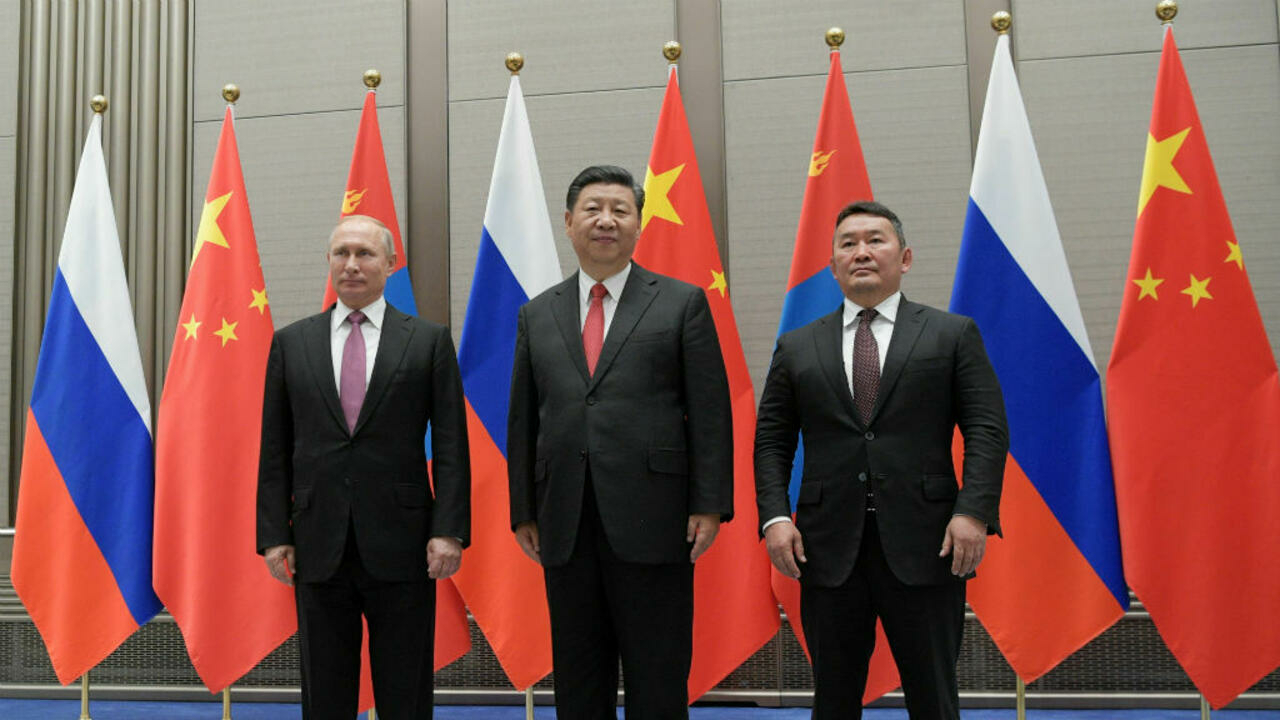 الرئيس الصيني شي جين بينغ والرئيس الروسي فلاديمير بوتين (أ ف ب)