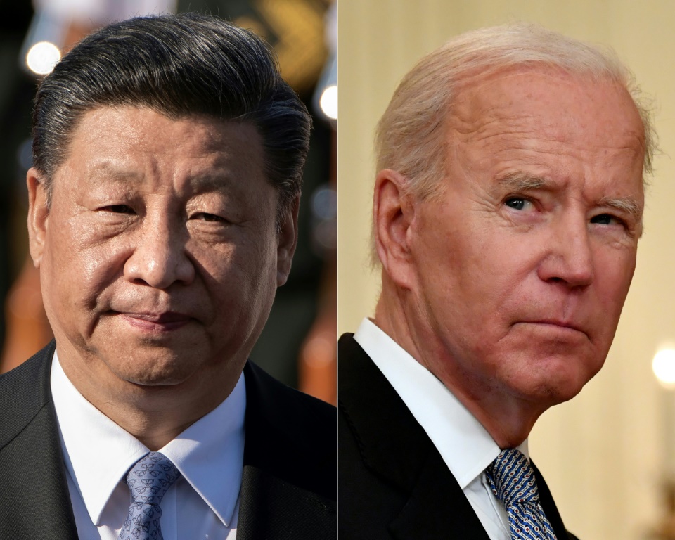 الرئيس الأمريكي جو بايدن ونظيره الصيني شي جين ينغ (أ ف ب)
