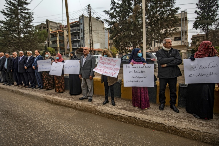 اكراد سوريون يتظاهرون في القامشلي مطالبين بعودة بناتهم المجندات قسرا في 28 تشرين الثاني/نوفمبر 2021(اف ب)