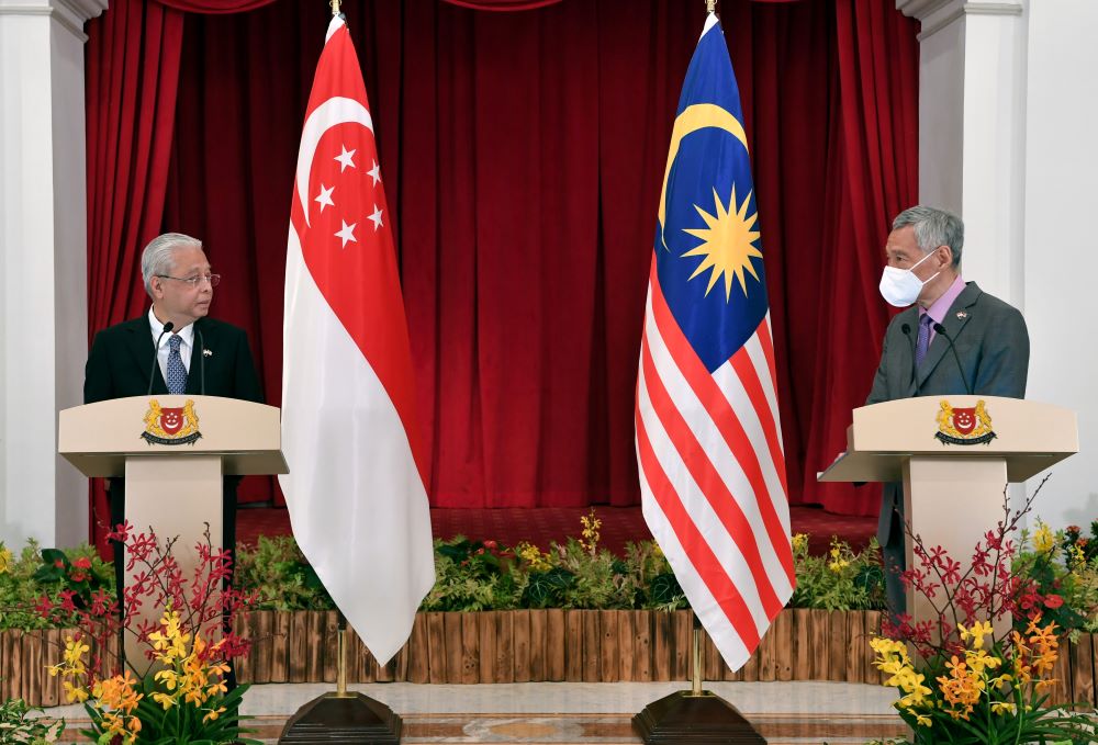سنغافورة تعيد فتح الحدود مع ماليزيا رغم انتشار سلالة أوميكرون(د ب أ)