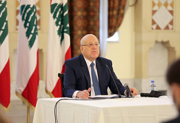 رئيس الحكومة اللبناني نجيب ميقاتي خلال مؤتمر صحافي في القصر الجمهوري في بعبدا قرب بيروت في 28 كانون الأول/ديسمبر 2021(ا ف ب)