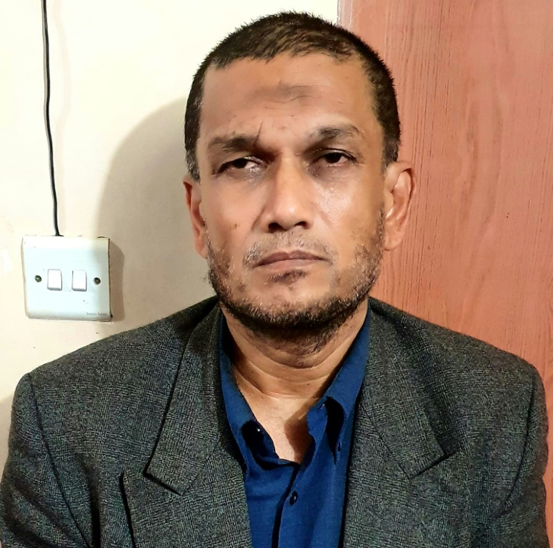 تم القبض على محمد شاه علي ، شقيق زعيم حزب ARSA عطاء الله أبو عمار جوني ، من مخيم للاجئين مع أسلحة ومخدرات محلية الصنع (أ ف ب)