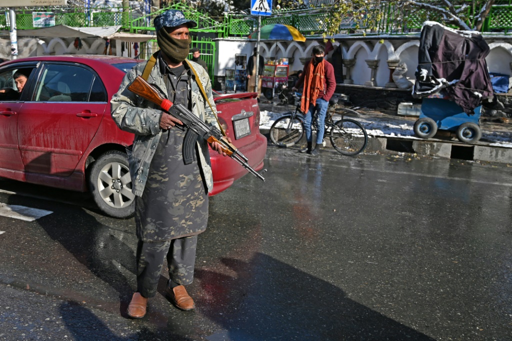 صورة لأحد قاتلي طالبان (أ ف ب)