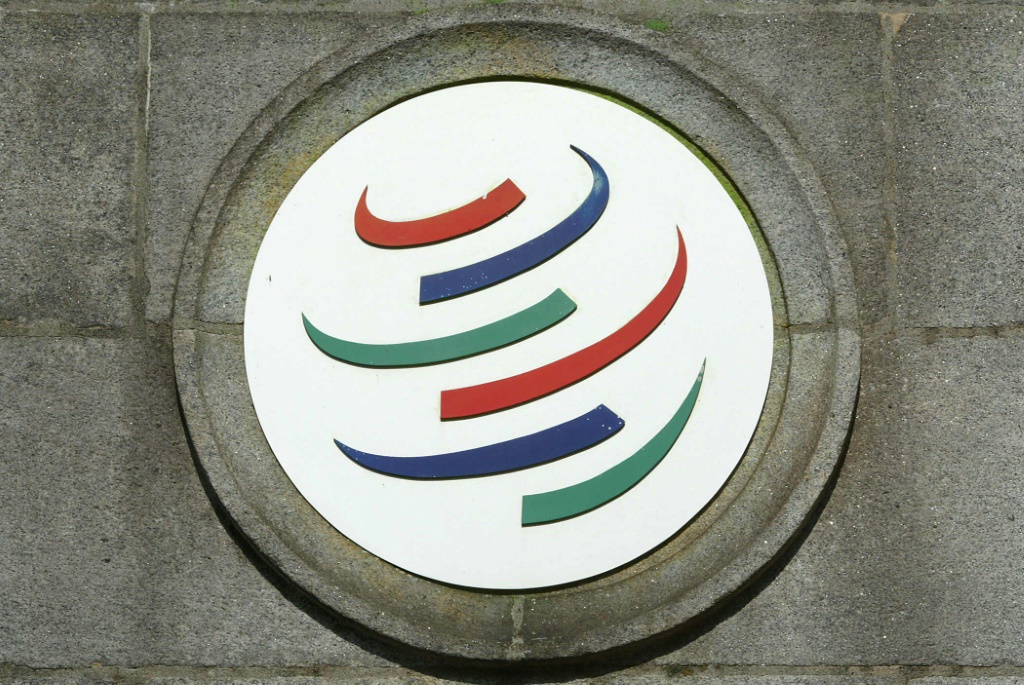 شعار منظمة التجارة العالمية في جنيف عام 2003(ا ف ب)