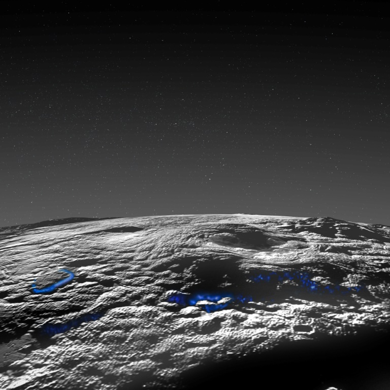 صورة منشورة في 29 آذار/مارس 2022 تظهر سطح كوكب بلوتو مع خطوط زرقاء رُسمت للإشارة إلى منطقة تكوّن البراكين الجليدية (ا ف ب)