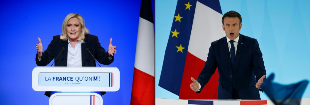    مارين لوبان وإيمانويل ماكرون يتنافسان على الرئاسة الفرنسية في إعادة لمعركة 2017 بينهما (ا ف ب)