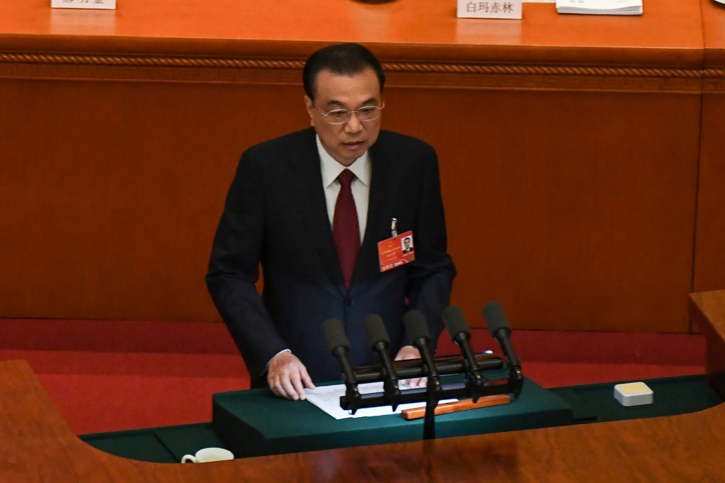 رئيس الوزراء الصيني لي كه تشيانغ في مجلس الشعب الصيني في بكين في 5 آذار/مارس 2022 (ا ف ب)