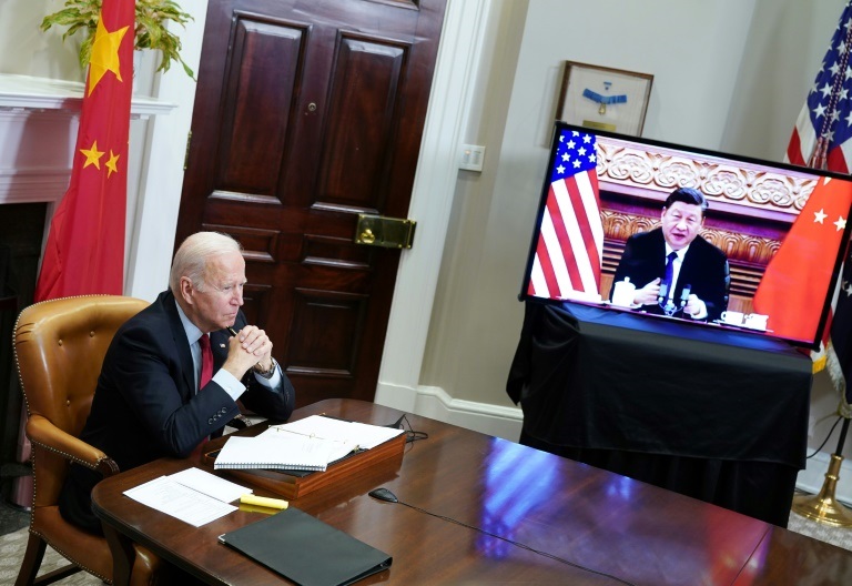 قمة افتراضية بين الرئيس الأميركي جو بايدن والرئيس الصيني شي جينبينغ في 15نوفمبر 2021 (ا ف ب)