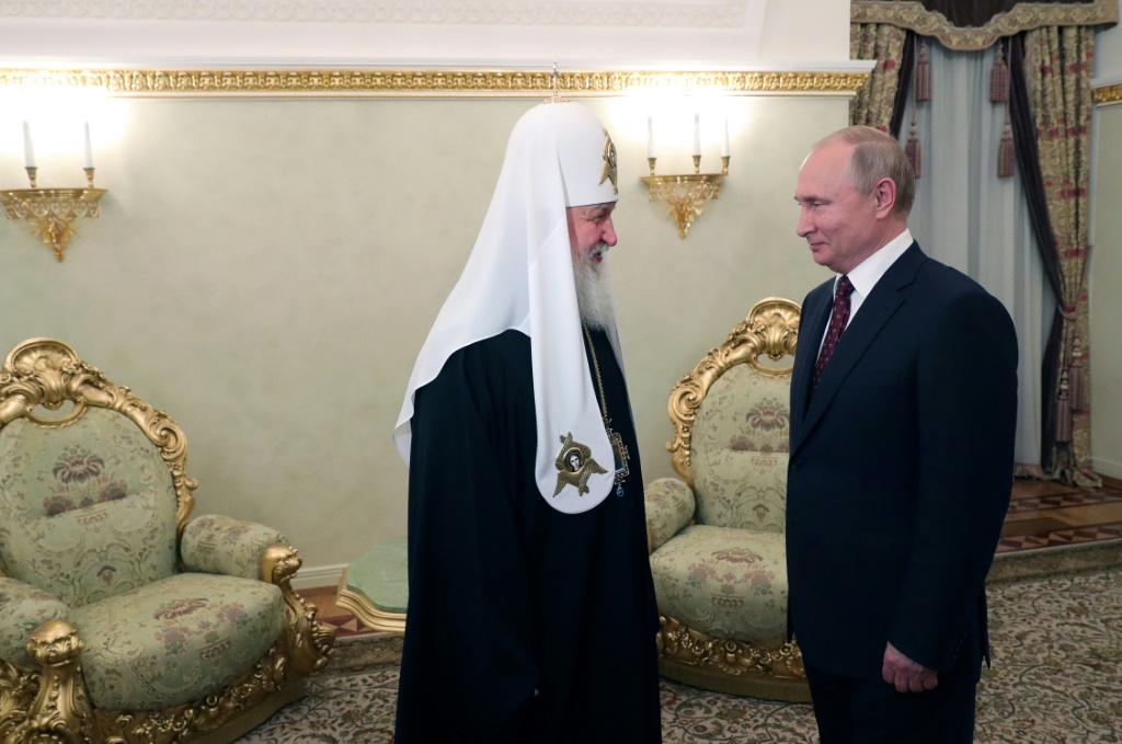 الرئيس الروسي فلاديمير بوتين يلتقي البطريرك كيريل في الكرملين في موسكو في 24 ايار/مايو 2019 (ا ف ب)
