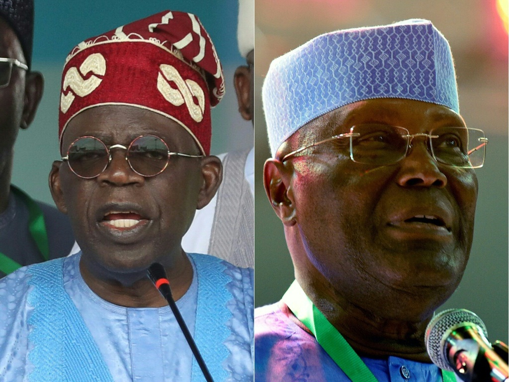 بولا تينوبو (إلى اليسار) وأتيكو أبو بكر كلاهما مرشحان لرئاسة نيجيريا (أ ف ب)   