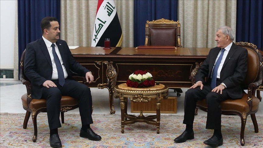 الرئيس العراقي عبداللطيف رشيد ورئيس الوزراء المكلف محمد شياع السوداني (الاناضول)
