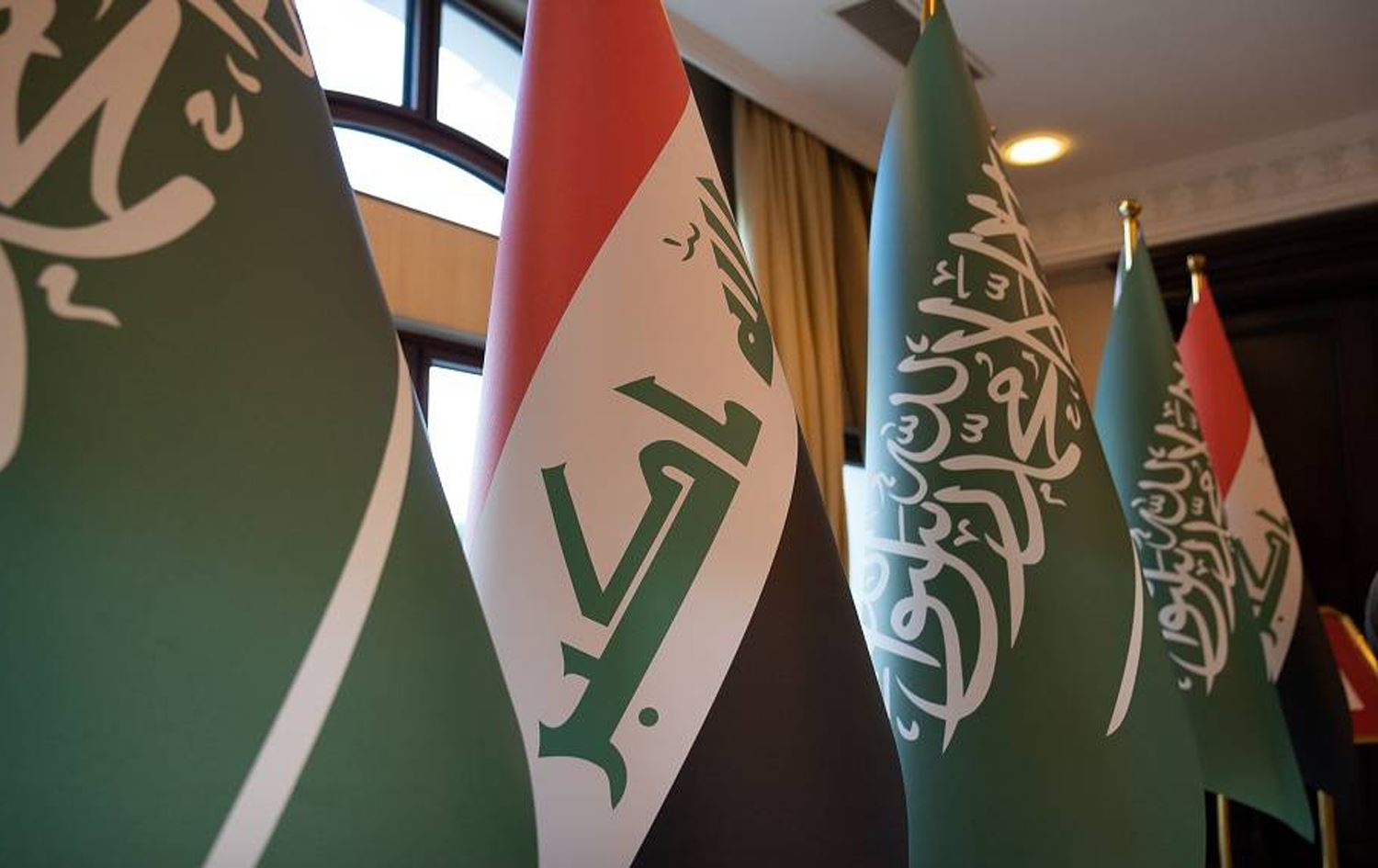 علم السعودية وعلم العراق (شبكة رووداو الإعلامية)