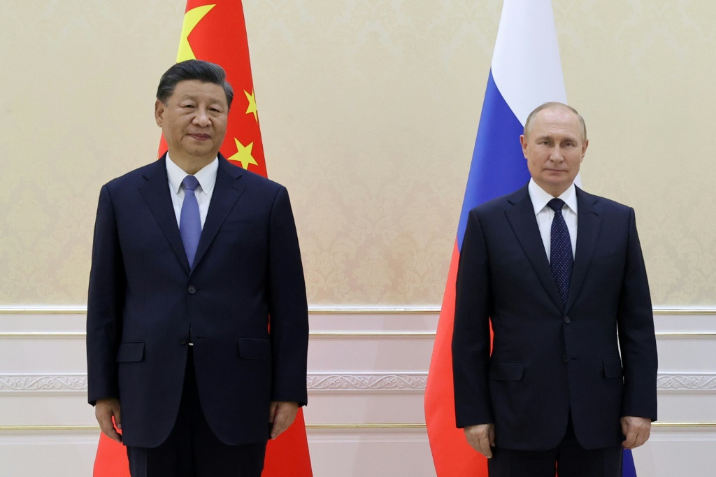 الرئيس الروسي ونظيره الصيني (ا ف ب)