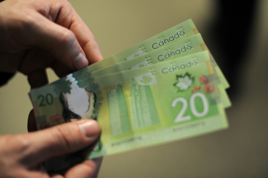    قال بنك كندا إن النمو الاقتصادي كان أقوى من المتوقع في الربع الثالث (أ ف ب)