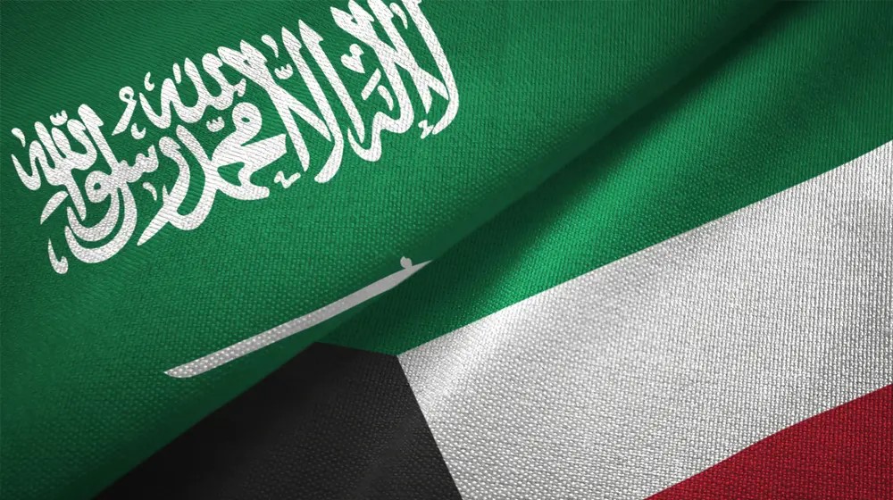 صورة مركبة لعلم السعودية وعلم الكويت (مواقع الكترونية)