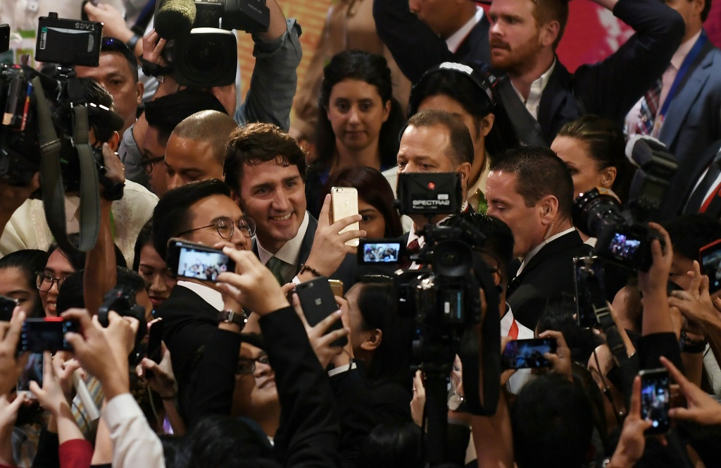 حذرت وسائل الإعلام الكندية رئيس الوزراء جاستن ترودو من أن إساءة معاملة الصحفيين تقوض حرية الصحافة (ا ف ب)