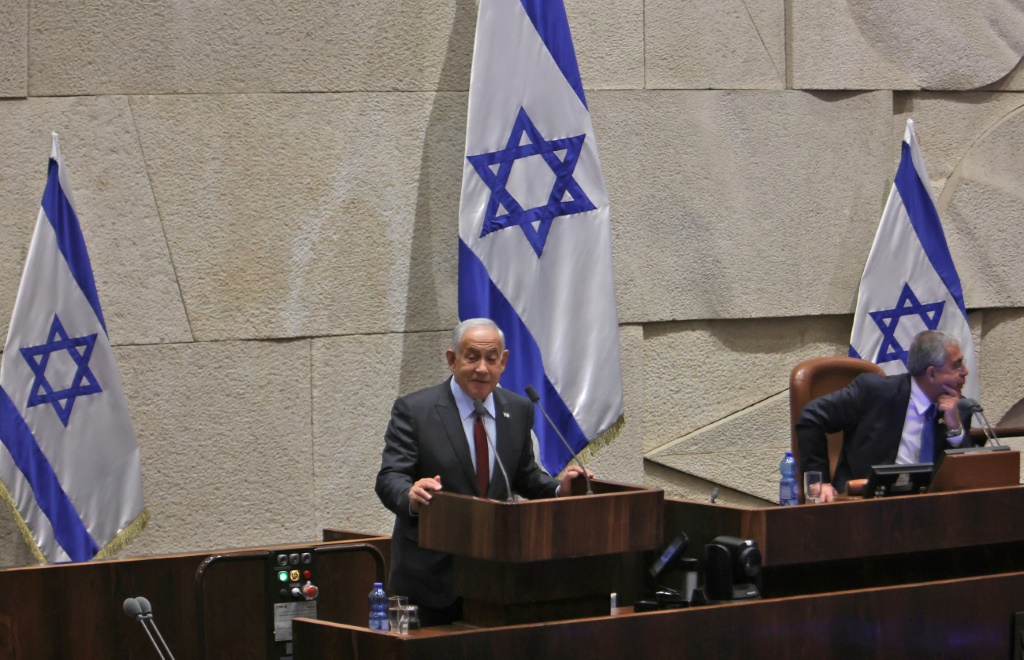    رئيس الوزراء الإسرائيلي المكلف بنيامين نتانياهو يتحدث في الكنيست (البرلمان الإسرائيلي) في 13 كانون الأول/ديسمبر (ا ف ب)   