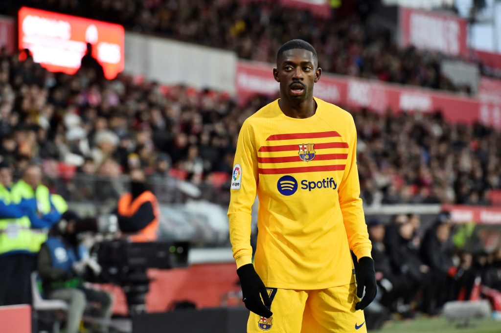 لاعب برشلونة الفرنسي عثمان ديمبيليه خلال مباراة فريقه أمام جيرونا في الدوري الاسباني على ملعب مونتيليفي في جيرونا في 28 كانون الثاني/يناير 2023 (ا ف ب)