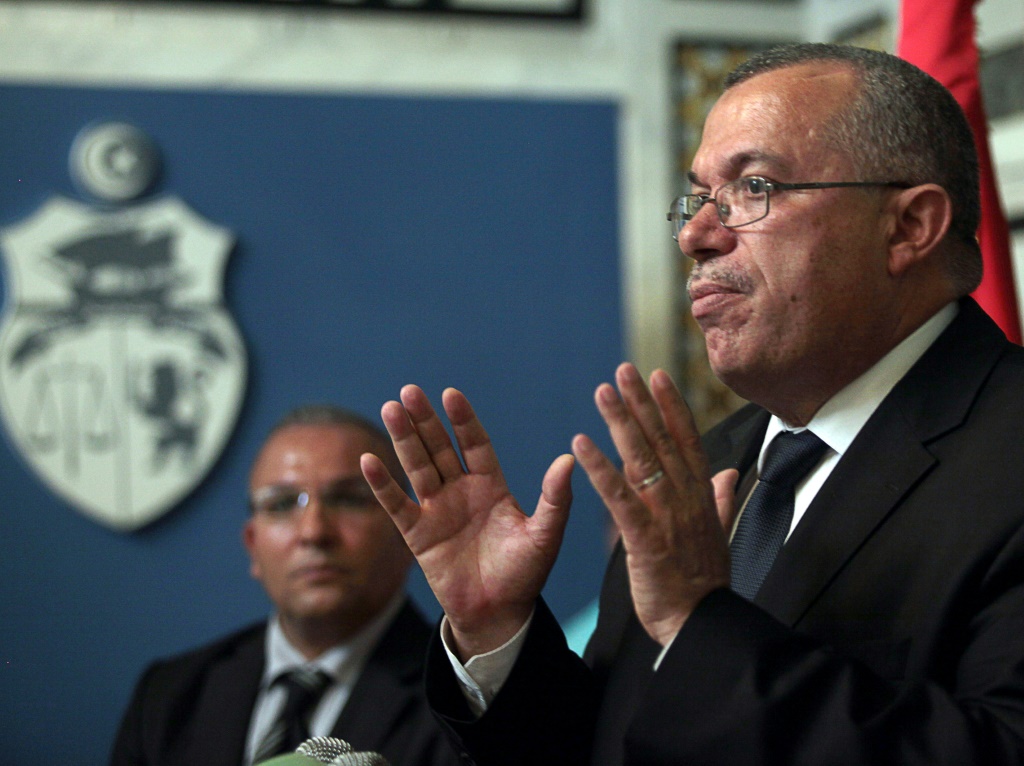 صورة من ارشيف 25 حزيران/يونيو 2012 لوزير العدل آنذاك نور الدين البحيري خلال مؤتمر صحافي في تونس (ا ف ب)