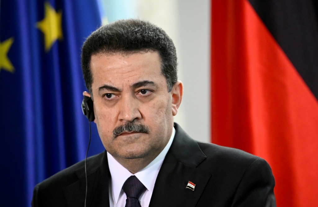 رئيس الوزراء العراقي محمد شياع السوداني خلال زيارة إلى برلين في 13 كانون الثاني/يناير 2023 (ا ف ب)