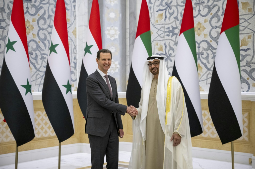       الرئيسان الإماراتي والسوري في أبوظبي في 19 آذار/مارس 2023 (ا ف ب)