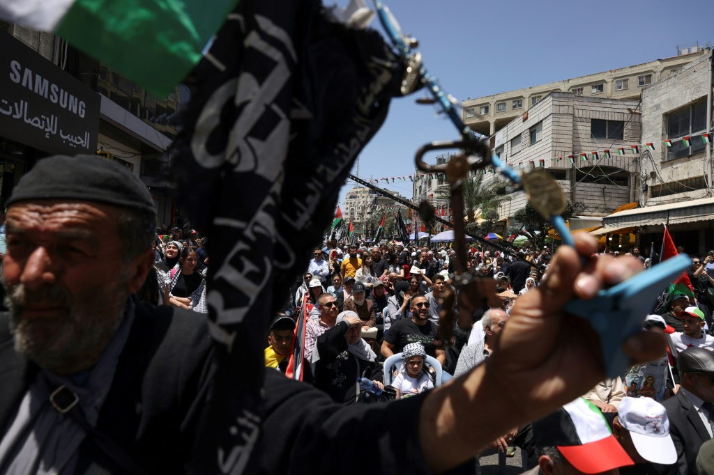     من تظاهرة الفلسطينيين في ذكرى النكبة في مدينة رام الله بالضفة الغربية المحتلة في 15 ايار/مايو 2023 (ا ف ب)
