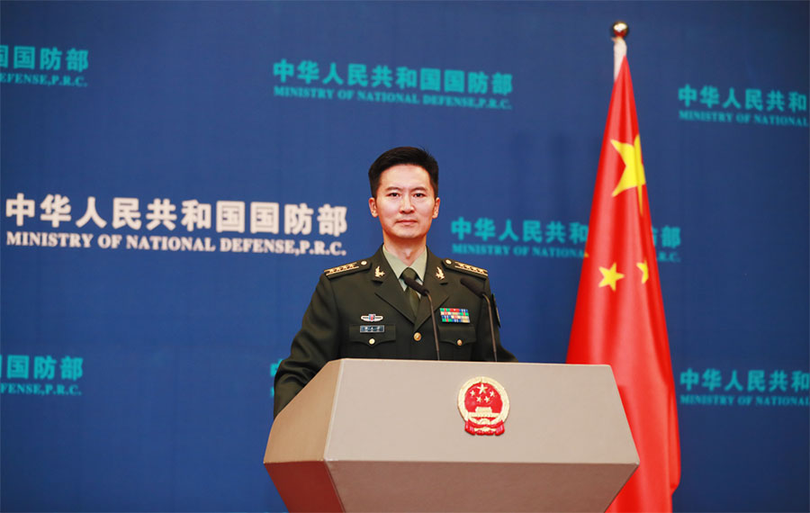 تان كه في، المتحدث باسم وزارة الدفاع الوطني الصينية (شينخوا)
