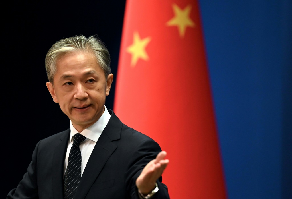     المتحدث باسم وزارة الخارجية الصينية وانغ وينبين خلال مؤتمر صحافي في 8 آب/أغسطس 2022 في الوزارة ببكين (ا ف ب)   