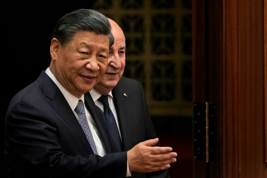 أشاد الرئيس الصيني شي جين بينغ بتخفيف حدة التوترات في الشرق الأوسط (ا ف ب)