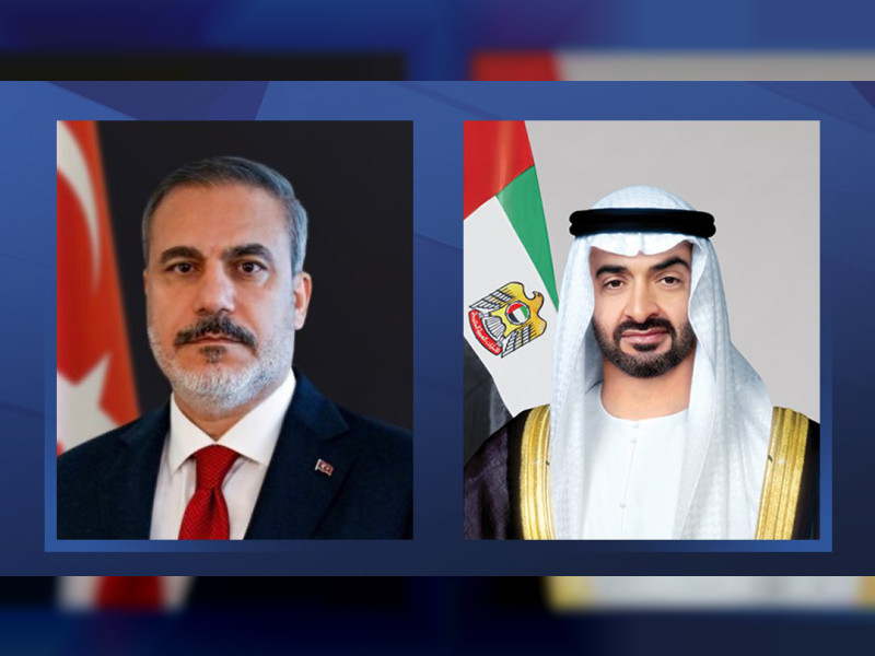 صورة مركبة تجمع رئيس الإمارات الشيخ محمد بن زايد آل نهيان مع وزير الخارجية التركي هاكان فيدان (وام)