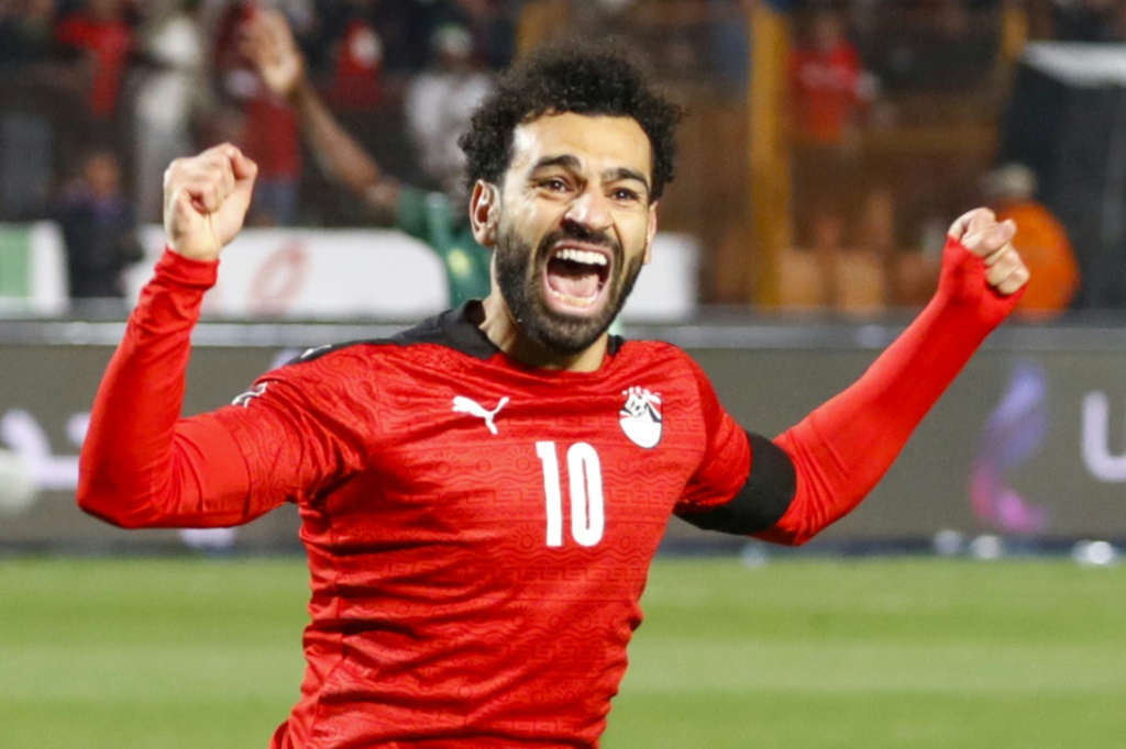 صلاح يحتفل بعد التسجيل لمنتخب مصر (ا ف ب)