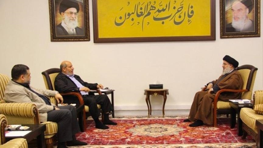 الأمين العام لـ"حزب الله"، حسن نصر الله، مع نائب ‏رئيس حركة "حماس" في قطاع غزة، خليل الحية، والقيادي في الحركة، أسامة ‏حمدان (الاناضول)