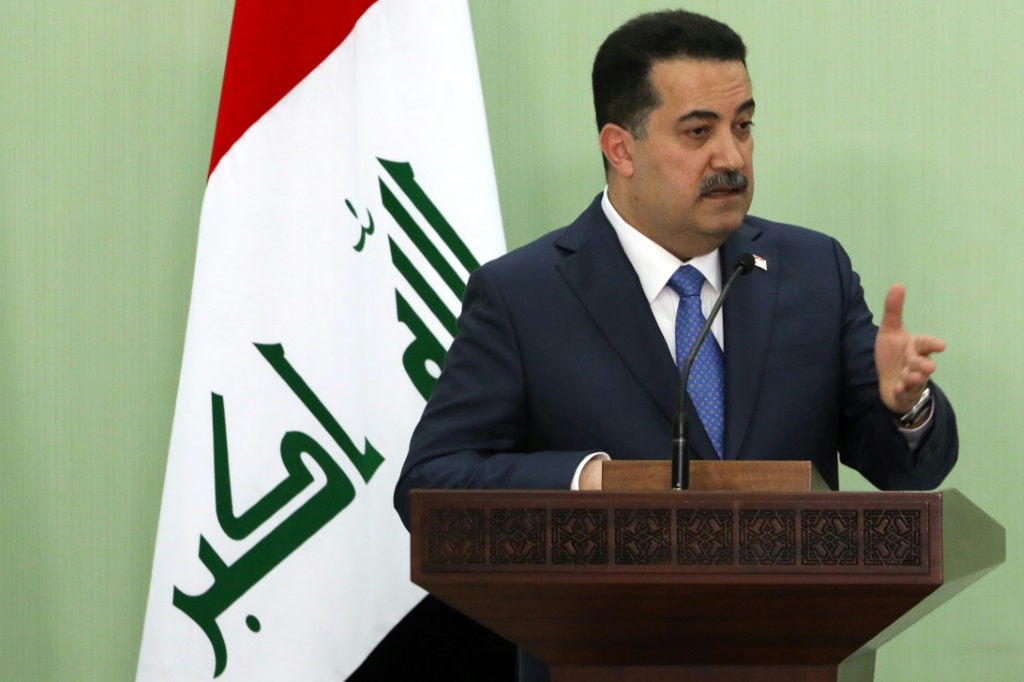 رئيس الوزراء العراقي محمد شياع السوداني في مؤتمر صحافي خلال زيارة لسوريا في 16 تموز يوليو 2023 (ا ف ب)