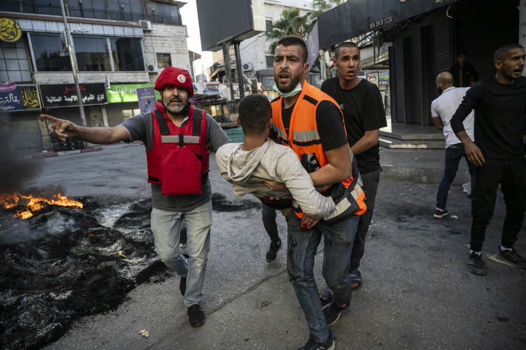بحسب البيان، ارتفعت بذلك حصيلة القتلى إلى 26083 شخصا، بالإضافة إلى 64487 مصابا منذ السابع من أكتوبر الماضي (أ ف ب)