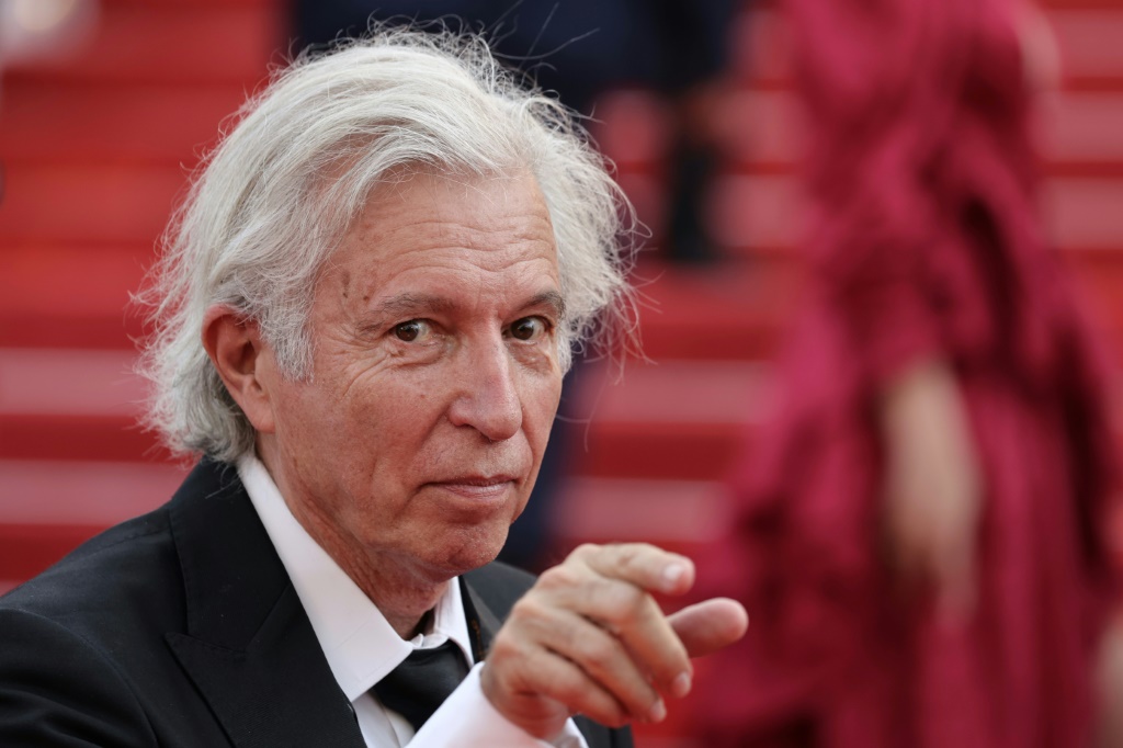 المخرج جاك دوايون على هامش مهرجان كان السينمائي في 7 تموز/يوليو 2021 (ا ف ب)