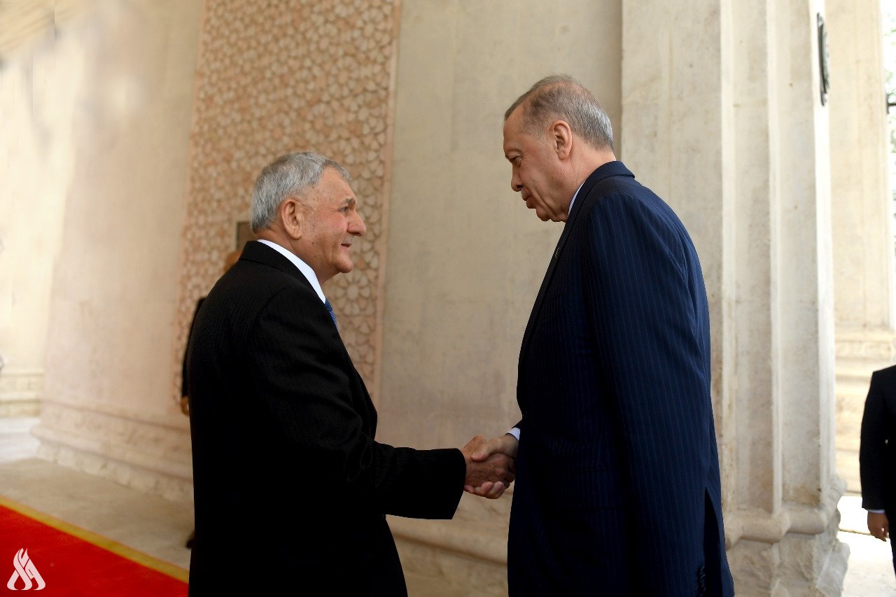 الرئيسان العراقي عبداللطيف جمال رشيد والتركي رجب طيب أردوغان (واع)