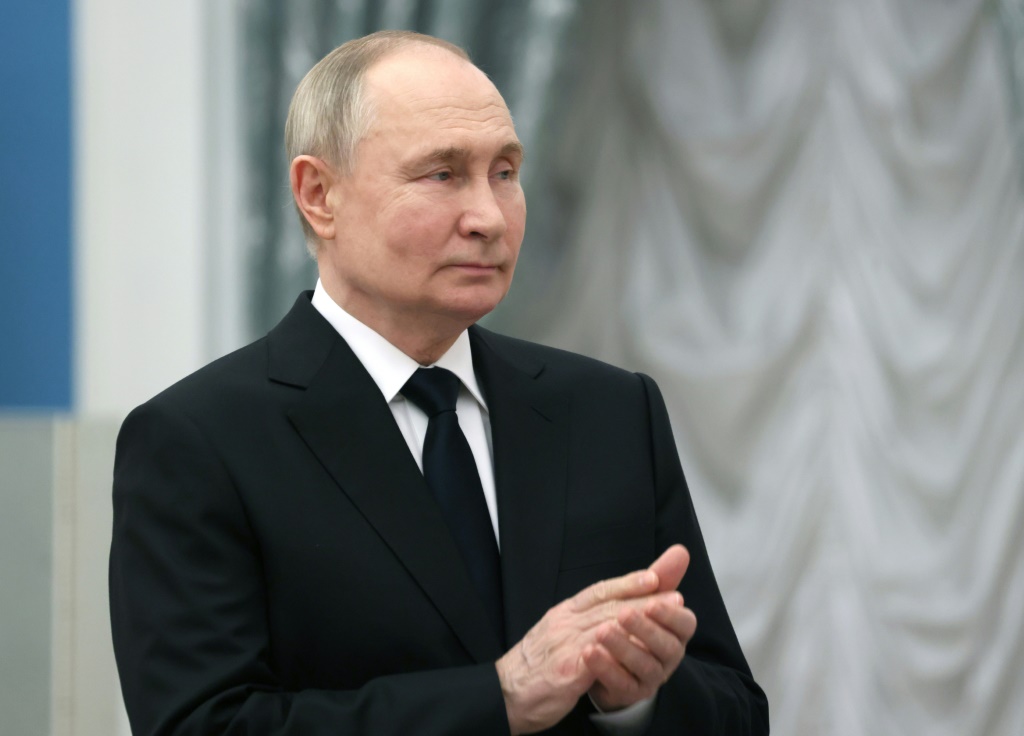 صورة وزعتها وكالة الانباء الروسية "سبوتنيك" تظهر الرئيس الروسي فلاديمير بوتين متحدثا خلال مراسم أقيمت في الكرملين في 26 آذار/مارس 2024 (ا ف ب)