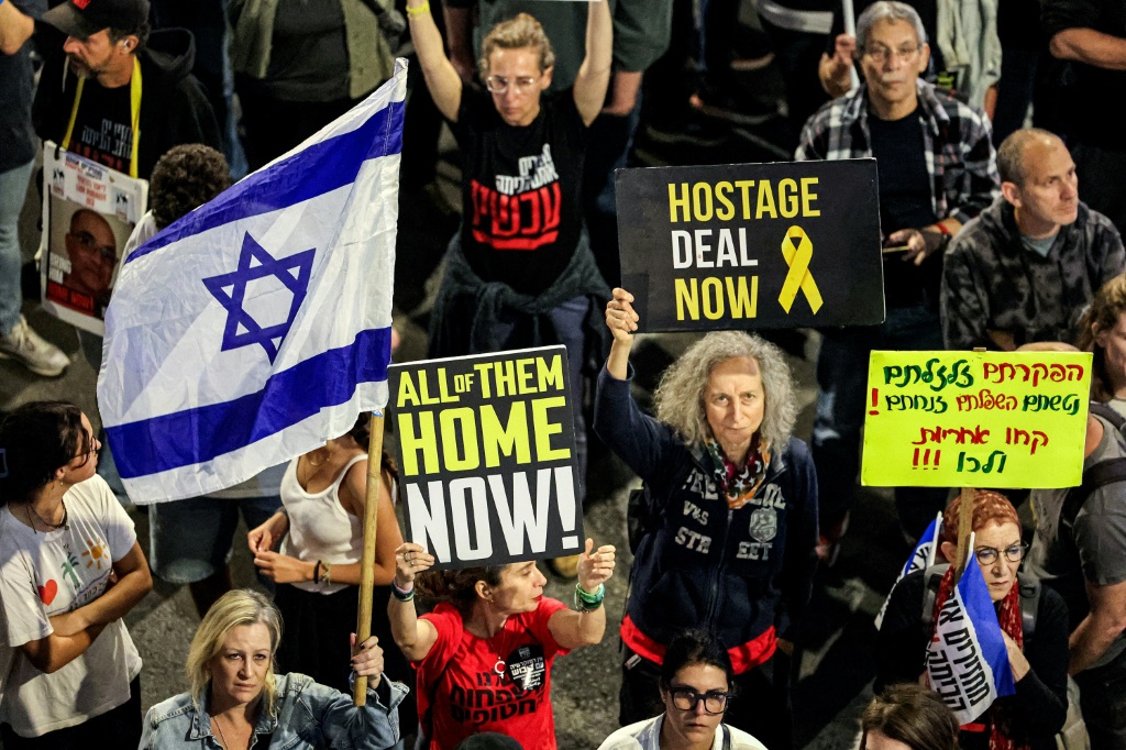  المعارضة تتهم نتنياهو بالسعي لزعزعة استقرار إسرائيل عبر قرارات تصفها بالكارثية (أ ف ب) 