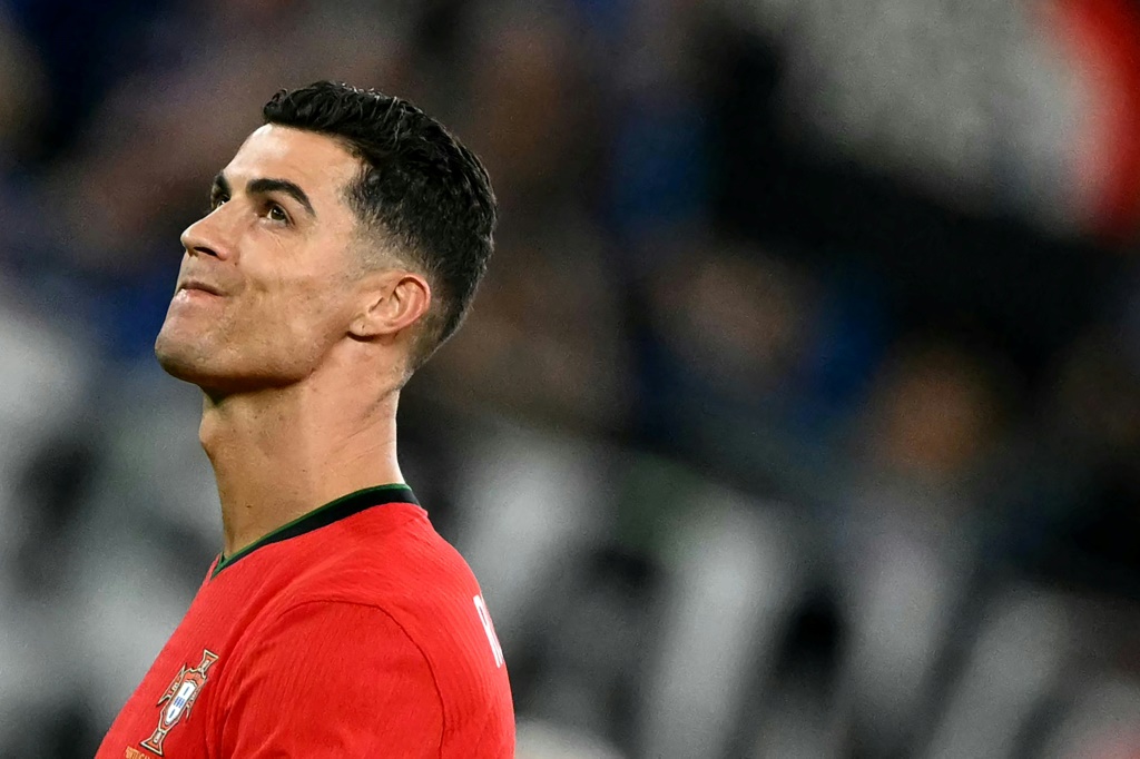 سجّل رونالدو ركلة الترجيح الأولى للبرتغال أمام فرنسا (ا ف ب)