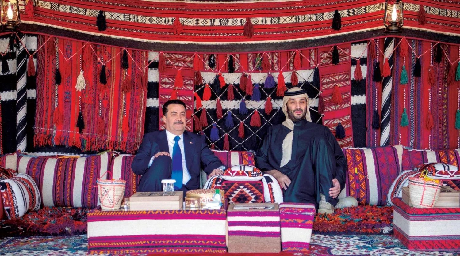 الأمير محمد بن سلمان يستقبل رئيس الوزراء العراقي محمد شياع السوداني (أ ف ب)