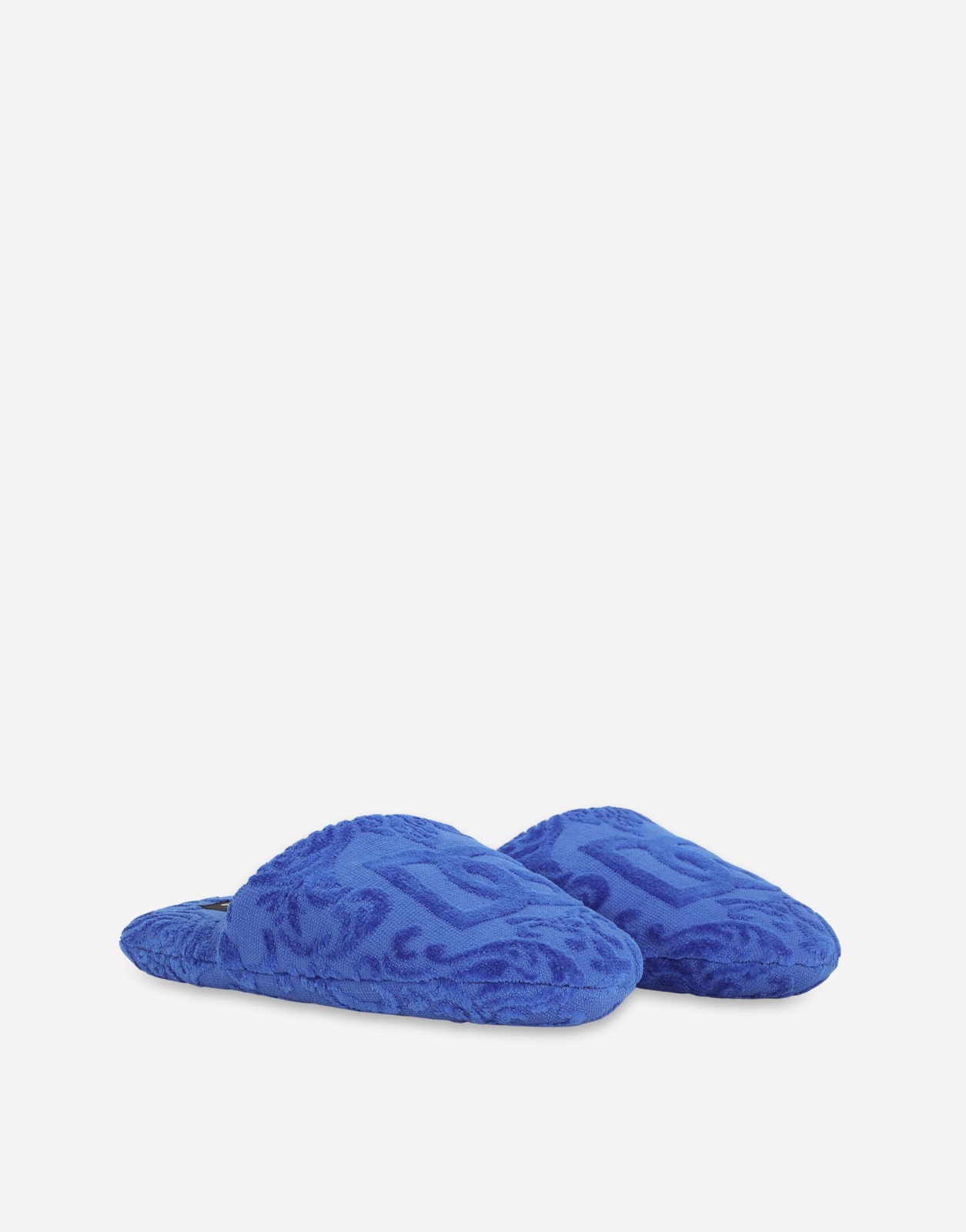 حذاء منزلي بنمط Slippers باللون الأزرق من Dolce & Gabbana - المصدر : Dolce & Gabbana