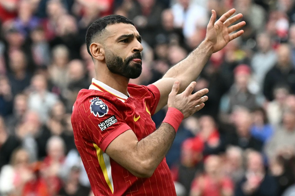 المهاجم المصري محمد صلاح يحتفل بالتسجيل لليفربول في مرمى ضيفه ساوثمبتون في الدوري الإنكليزي لكرة القدم. ليفربول، شمال غرب إنكلترا، في 8 آذار/مارس 2025 (ا ف ب)   