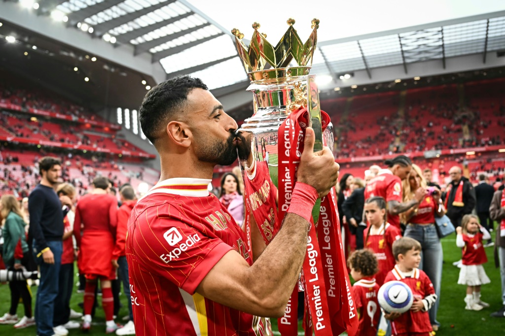 قاد صلاح ليفربول إلى إحراز لقب الدوري الإنكليزي (أ ف ب)